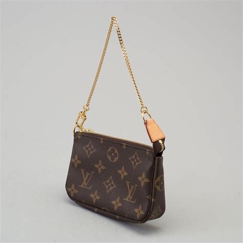 louis vuitton small pouch|louis vuitton small round bag.